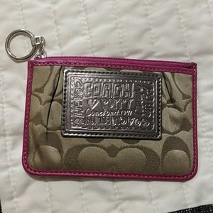 Tiny coach wallet